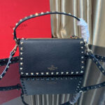 Valentino Small Rockstud Grainy Calfskin Crossbody Bag With All-Over Studs Black